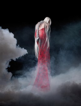 Spinal column dress with fiber optics representing the intricate nerve network that extends throughout the body.
