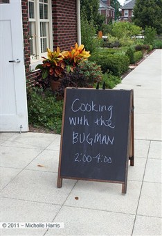 A sign beckons visitors into the Franklin Park Conservatory in Columbus, OH, to dine on insects as part of a 2011 exhibit.