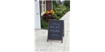 A sign beckons visitors into the Franklin Park Conservatory in Columbus, OH, to dine on insects as part of a 2011 exhibit.
