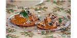 Gourmet crackers with mango paste and sauteed ant brood with peanuts, mint, and red pepper