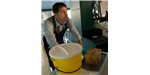Jacopo Annese, head of The Brain Observatory at UC San Diego, prepares the brain for cutting by embedding it in a block of gelatin.