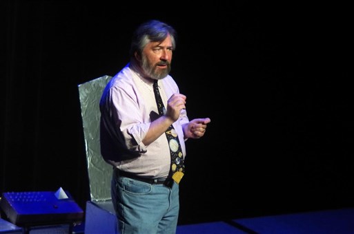 Science writer Greg Scheiderer introducing the play “Asteroids of Love” by Jennifer Dice, directed by Catherine Blake Smith.