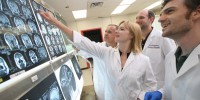 Neuroscience professor Italo Mocchetti (far left) mentors doctoral students as part of Georgetown University’s Interdisciplinary Program in Neuroscience, a multi-disciplinary collaboration encompassing 14 university departments.Joe Shymanski | Freelancer, 2009