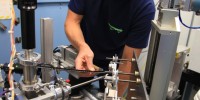 Uwe Bergman measures the distance and angle between fossil, x-ray beam, and detector. Each must be just right to get the best possible results.