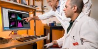 Steven Kauder (right) and Eric Verdin examine HIV DNA in the Flow Cytometry Lab at this year's #1 US institution, The J. David Gladstone Institutes.Gladstone | C. Goodfellow