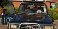 En route from South Sudan to Uganda to deliver samples stored in the liquid nitrogen tanks on top of Reeder's Land Rover to the Entebbe office of Centers for for Disease Control and Prevention.Courtesy of DeeAnn Reeder