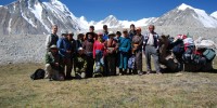 The Mongolian Aquatic Insect Survey team and pack camel, with Olgii, Nairamdal, and Burged Mountains in the backgroundJohn Morse