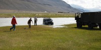 One of the team's Russian jeeps crossing the river Tsagaan. The 