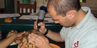 Javier Lopez, veterinarian for the Durrell Wildlife Conservation Trust, helping in the ploughshare captive breeding centre at Ampijoroa in MadagascarDurrell Wildlife Conservation Trust