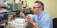 Sal Sadoti, one of several engineering technicians at #1-ranked ADInstruments, tests a prototype of a new software-controlled isolated stimulator.