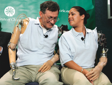 TOUCH PIONEERS: Amputees Claudia Mitchell and Jesse Sullivan talk during a September 2006 press conference at the National Press Club. Both underwent a revolutionary surgery that allowed them to feel their missing hands by transplanting sensory nerves into their upper chests.